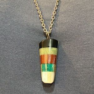 Unique polished stone pendant on silver chain